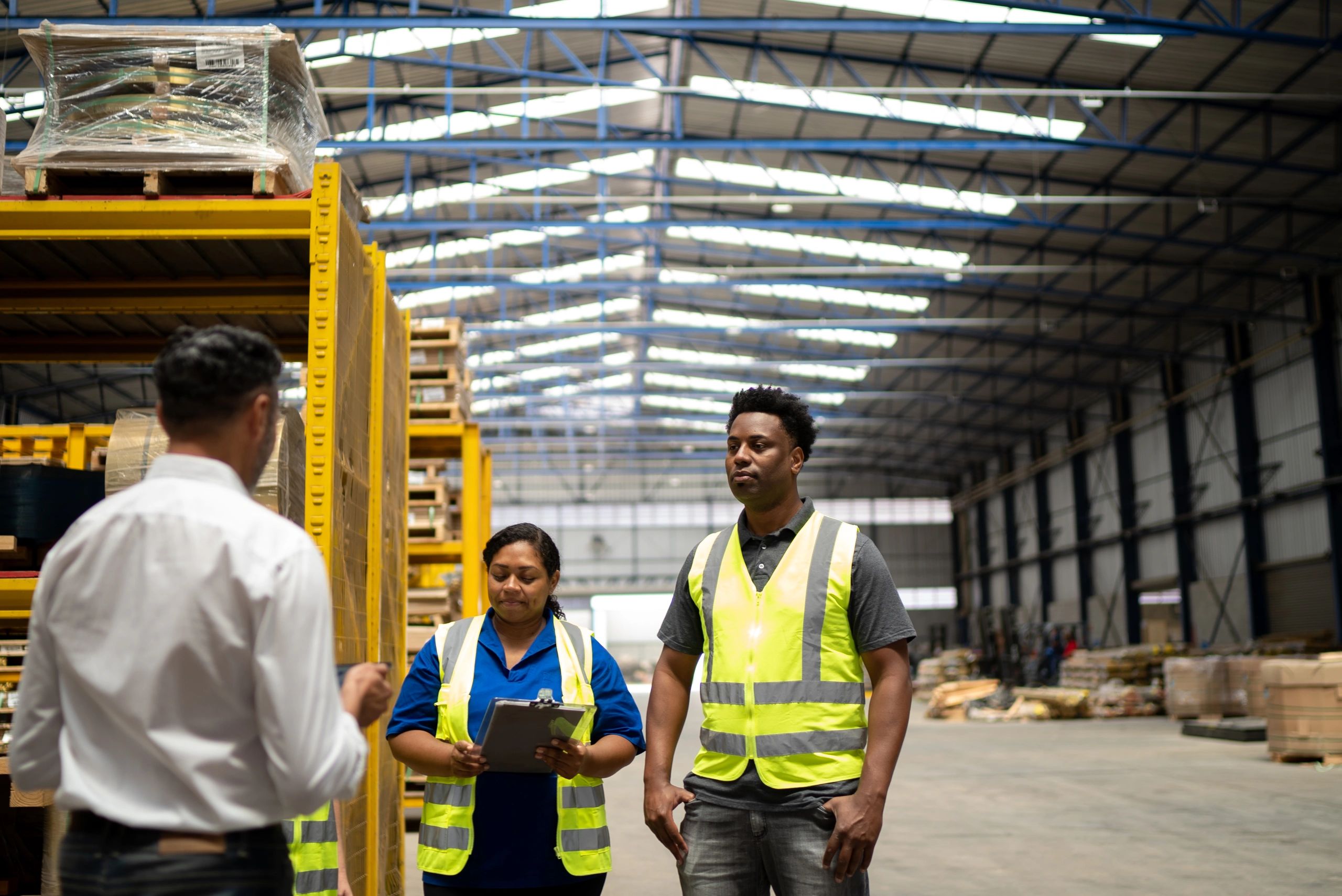 Warehouse and logistics team in discussion